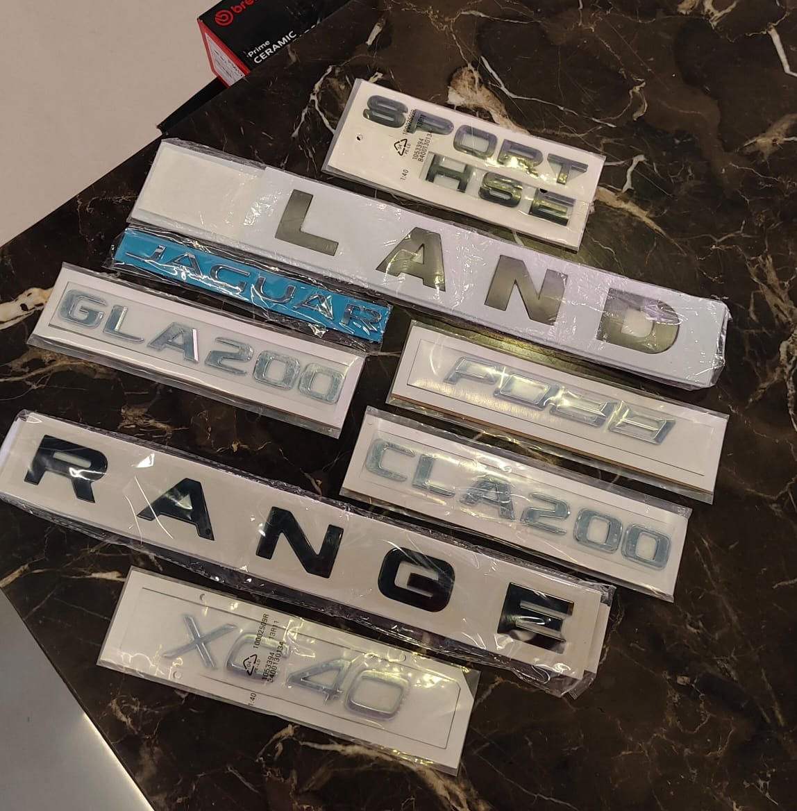 Luxury Car Exterior Monogram & Model Badge Emblem Set (Range Rover, Land Rover, Jaguar, Mercedes-Benz, Volvo)